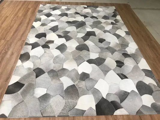 Canvanation Tapis Patchwork en Peau de Vache Gris – Design Unique en Éventail, Véritable Cowhide pour Salon et Chambre
